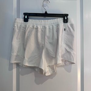 Athletic white shorts.